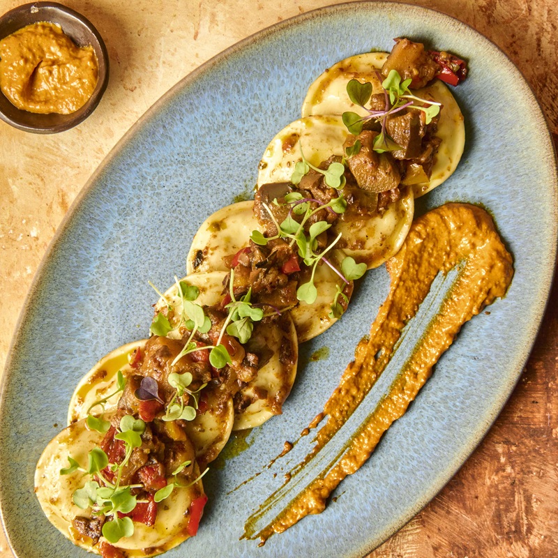 Oval of cod brandade with caponata and romesco sauce